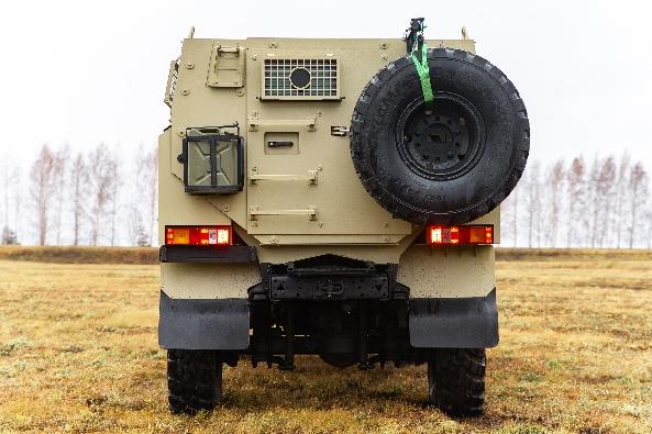 Predator driving through mud